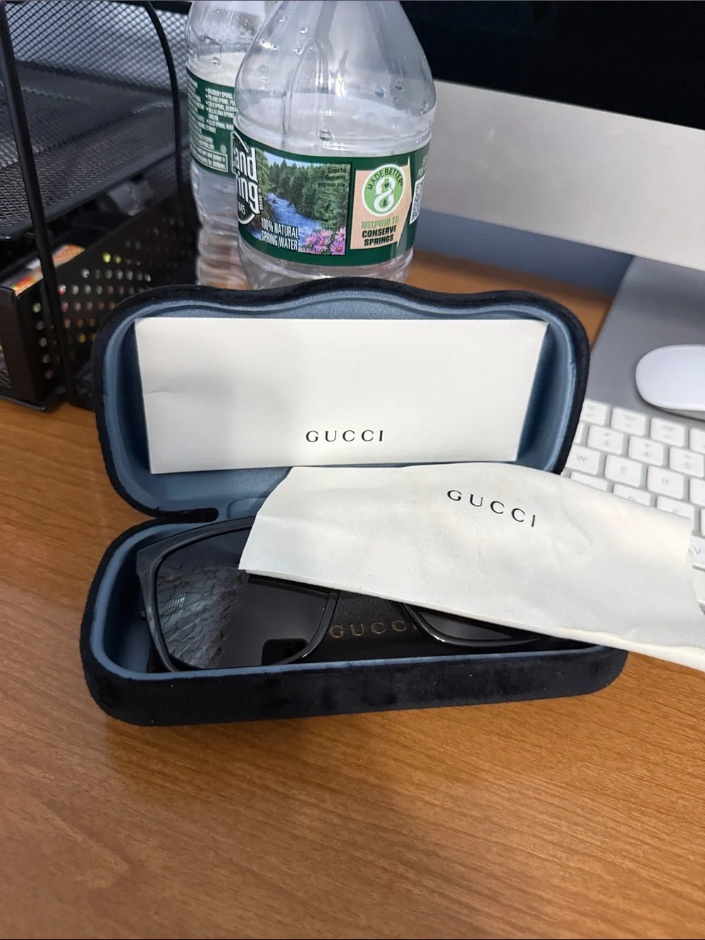 Gucci Black Sunglasses with Gold Plaque
